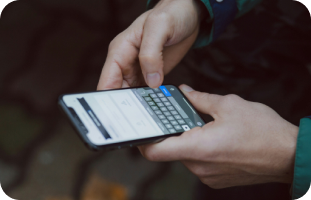 Person using smartphone for digital management of Myasthenia Gravis